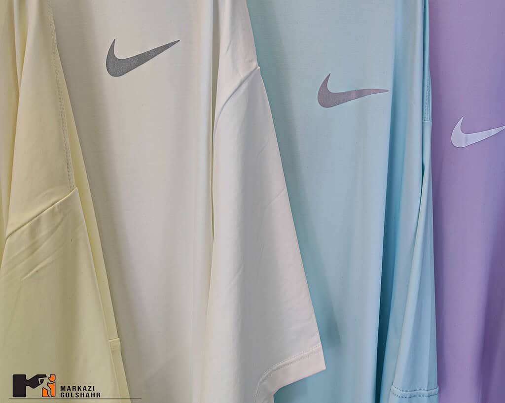 تصویر نمای نزدیک تیشرت لانگ زنانه نایک کد 080445